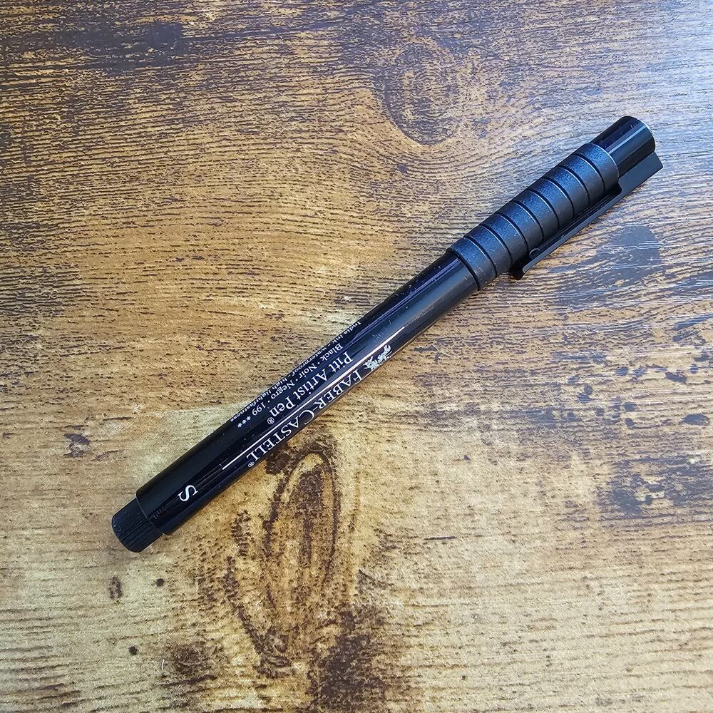 Faber-Castell Pitt Artist Pen with black India ink and a Superfine (S) tip